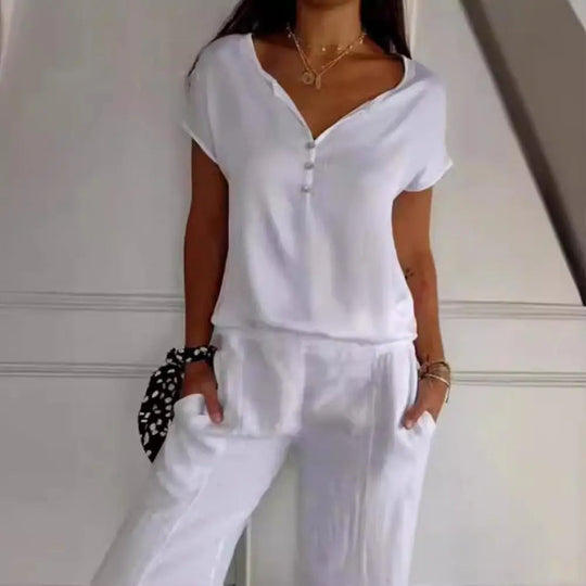 Elegante top Dames | V-hals & knoopdetails